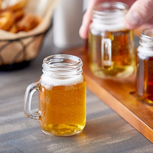 Acopa Rustic Charm 4.75 Oz. Mini Mason Jar With Handle - 12/Case 1 Acopa Rustic Charm 4.75 Oz. Mini Mason Jar With Handle - 12/Case